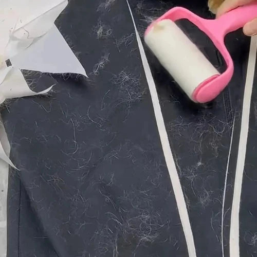The lint roller is picking up dog hair left on your clothes.
